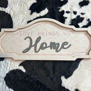 “Love brings us home” sign!